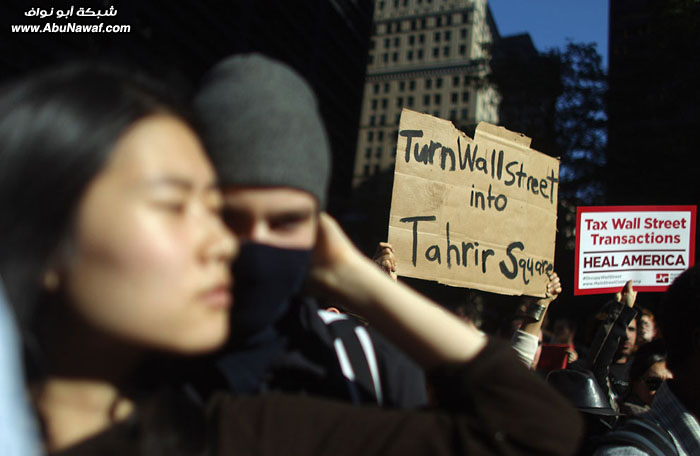 صور حول العالم : مظاهرات وول ستريت + هاتف يقيس رائحة الفم ..والمزيد
